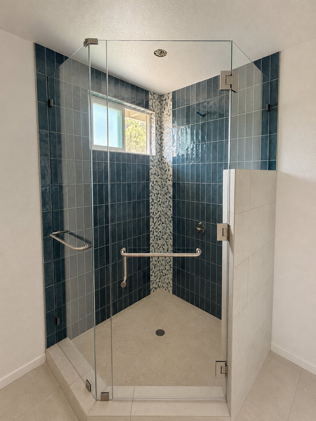 Finished frameless 90-degree shower installed by CV Glass